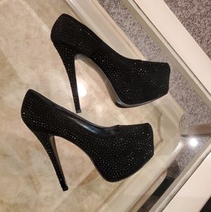 Black rhinestone pumps